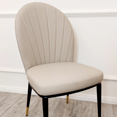 Minimalistic Multi-Use Leather Dining Chair with Beautiful Round Finish