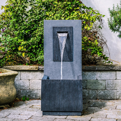 Elegant Outdoor Water Feature with Contemporary Design and Cement Finish