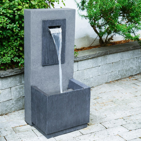 Elegant Outdoor Water Feature with Contemporary Design and Cement Finish