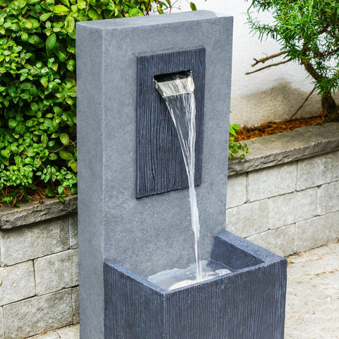Elegant Outdoor Water Feature with Contemporary Design and Cement Finish
