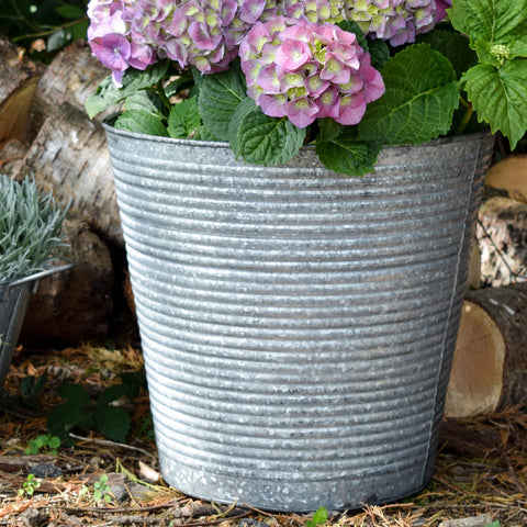Rustic Round Galvanized Outdoor Planter with Drainage System