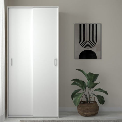 Sleek and Modern Wardrobe with Organized Sliding Door Design in White