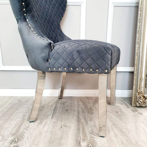 Classic Buttoned Dining Chair with Lion Knocker and Elegant Chrome Legs