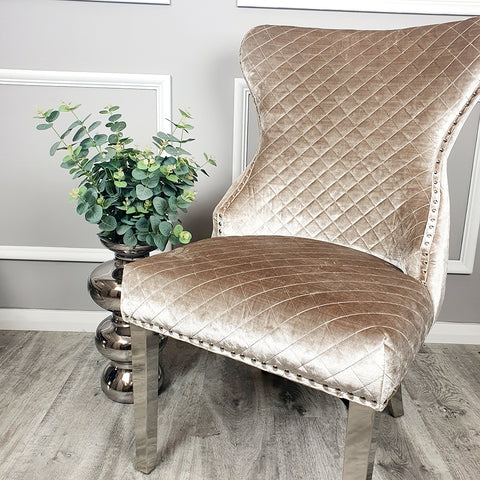 Classic Buttoned Dining Chair with Lion Knocker and Elegant Chrome Legs