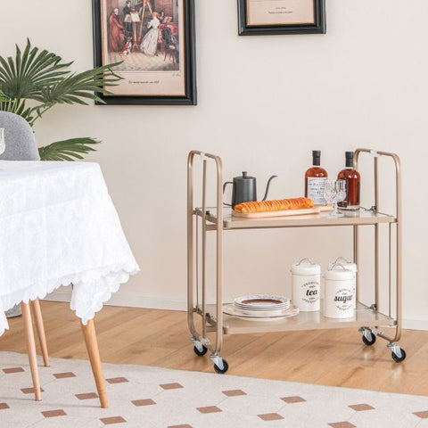 Compact Mobile Storage Cart with Foldable Feature and Tempered Glass Shelf in Gold